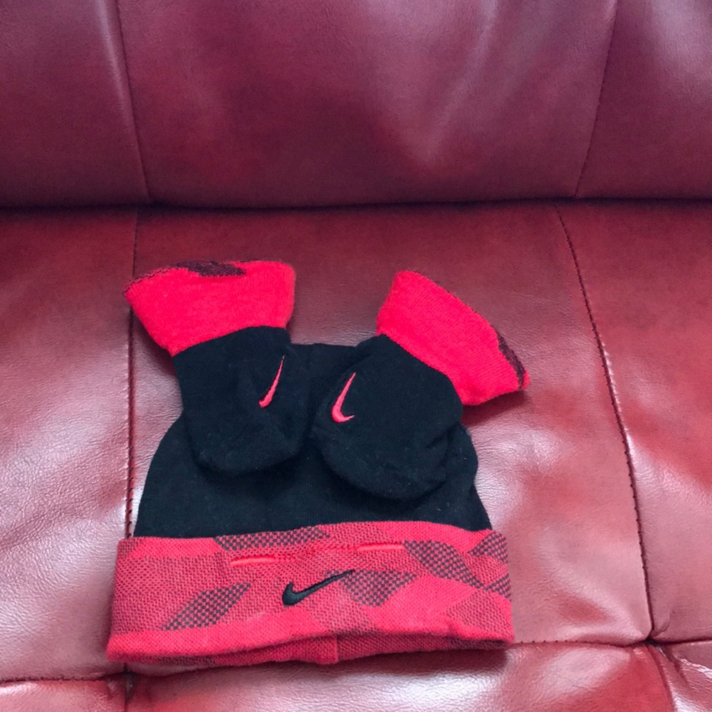 Red and black nike hat and matching socks